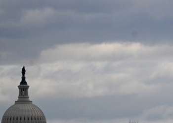 The dome of the US Capitol is seen on a cloudy day in Washington, DC in January 2024 / ©AFP