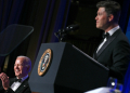 US President Joe Biden laughs as comedian Colin Jost (R) speaks during the White House Correspondents' Association dinner at the Washington Hilton on April 27, 2024 / ©AFP