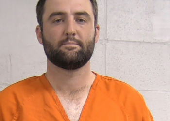 Louisville police handcuffed and booked Scottie Scheffler on multiple charges including assaulting a police officer, and took his mugshot with him dressed in an orange prison jumpsuit. ©AFP
