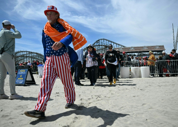 Diehard fans of former president Donald Trump had traveled from as far afield as Hawaii to attend his rally in Wildwood, New Jersey, with some camping out on a beach / ©AFP