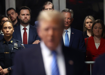 Former US president Donald Trump has been joined by allies from the US Senate including J.D. Vance (red tie) and Tommy Tuberville (to the right of Vance) as he attends court / ©AFP