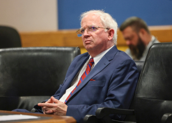 John Eastman, seen here in a Georgia courtroom, denies Arizona charges that he tried to subvert the 2020 presidential election / ©AFP